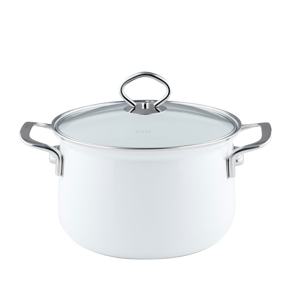 A white enamel porcelain stewpot with a glass lid and stainless steel handles.