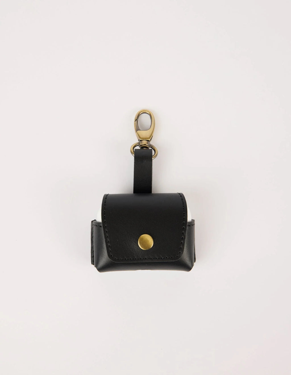 Black leather air pod case with gold accents on a white background