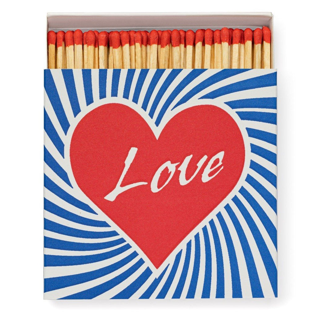 Matchbox with heart that says love