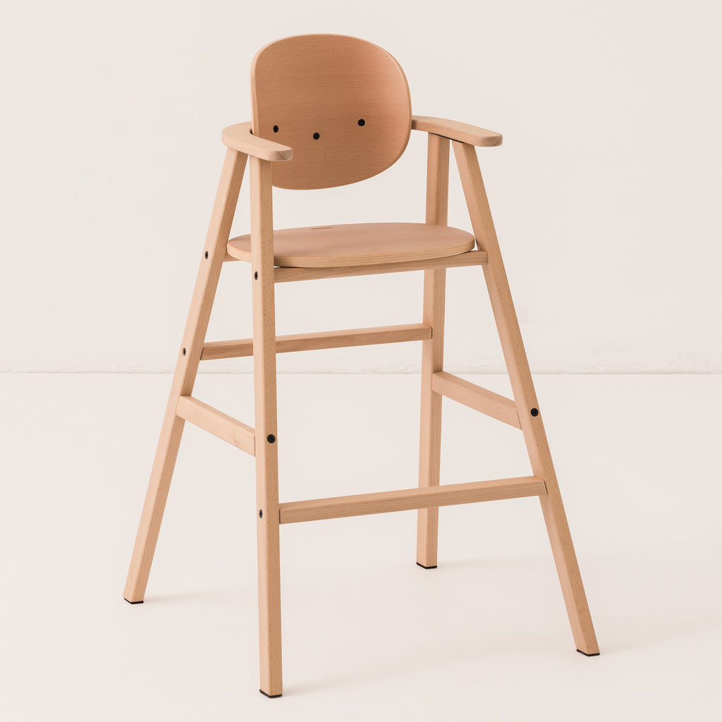 A wooden highchair without bar