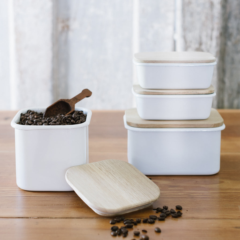 Enamel Storage Containers with Acacia Wood Lids on Wooden Surface