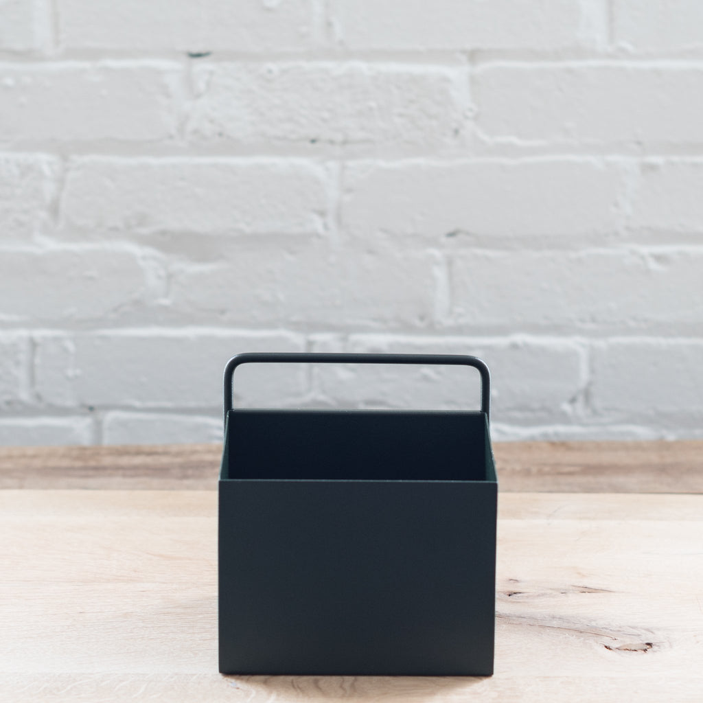 Black powder coated planter wall box.