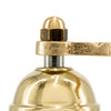 Close-up of a brass pepper mill on a white background