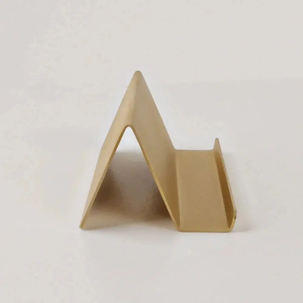 Brass card holder seen from the side