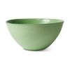 A matte sage green ceramic bowl with a wide, shallow depth, shown from a three-quarters perspective on a clean white background.