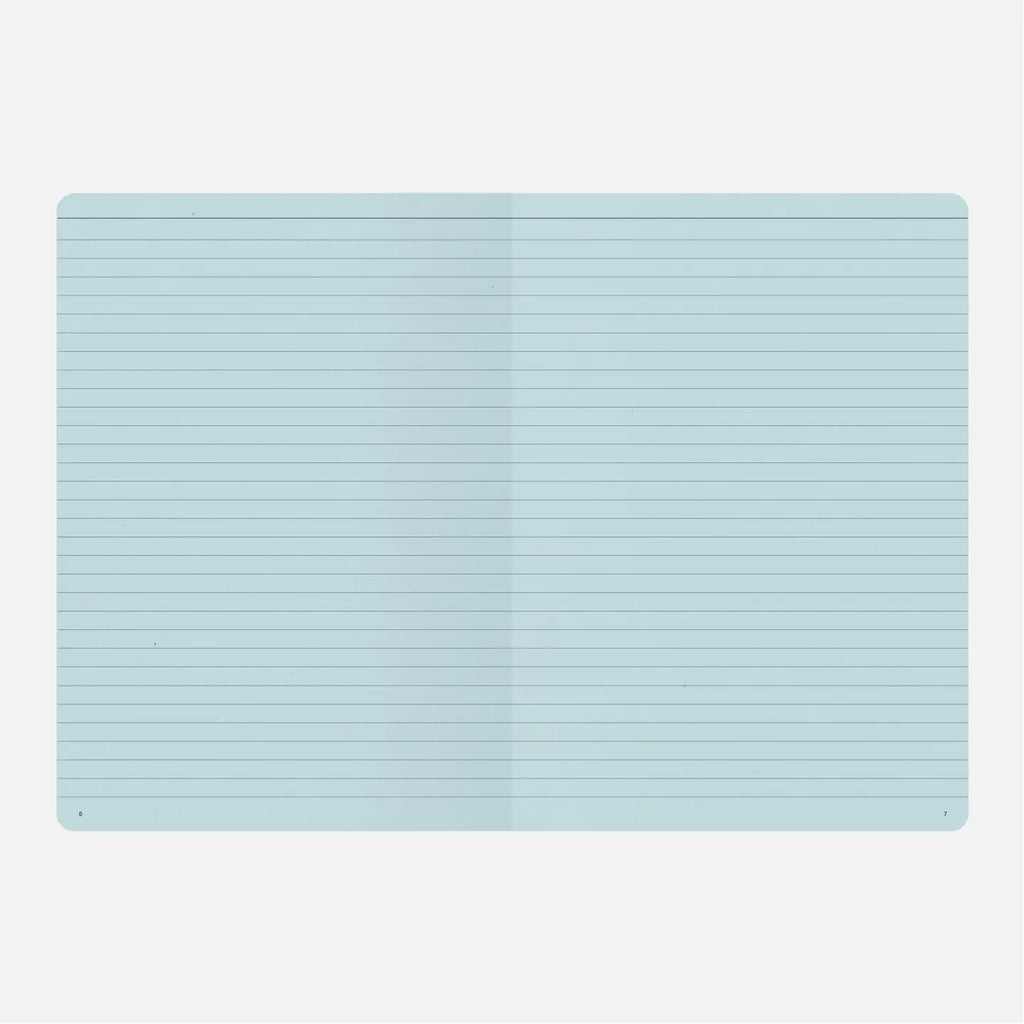 Light blue rectangular mat with a ribbed texture on a white background