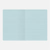 Light blue rectangular mat with a ribbed texture on a white background