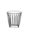 Clear glass tumbler with vertical ridges on a white background