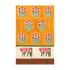 Decorative fabric with floral patterns and animal illustrations on a yellow and beige background.