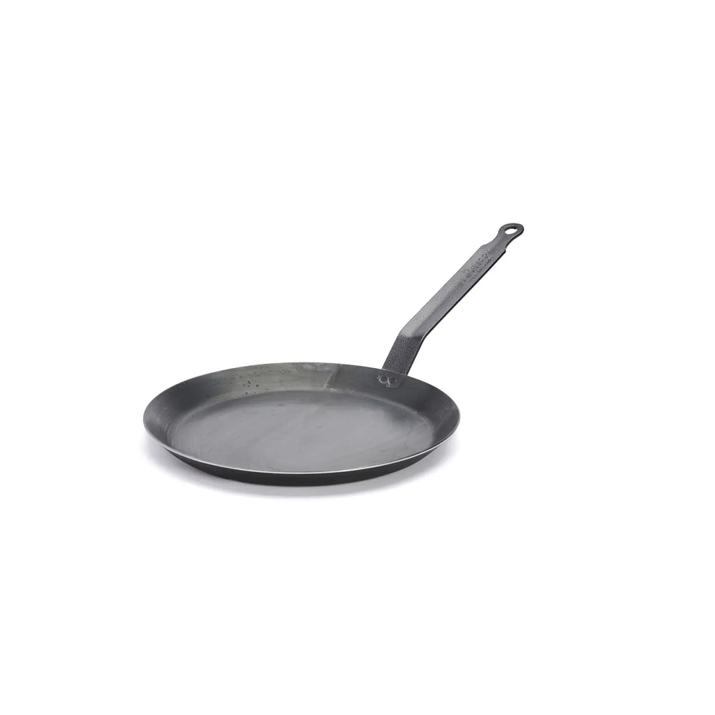 Black frying pan on a white background