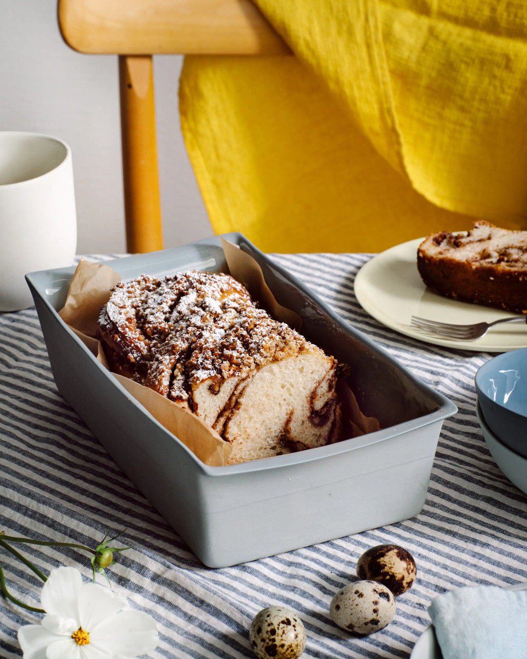 small porcelain baking dish with bread in it