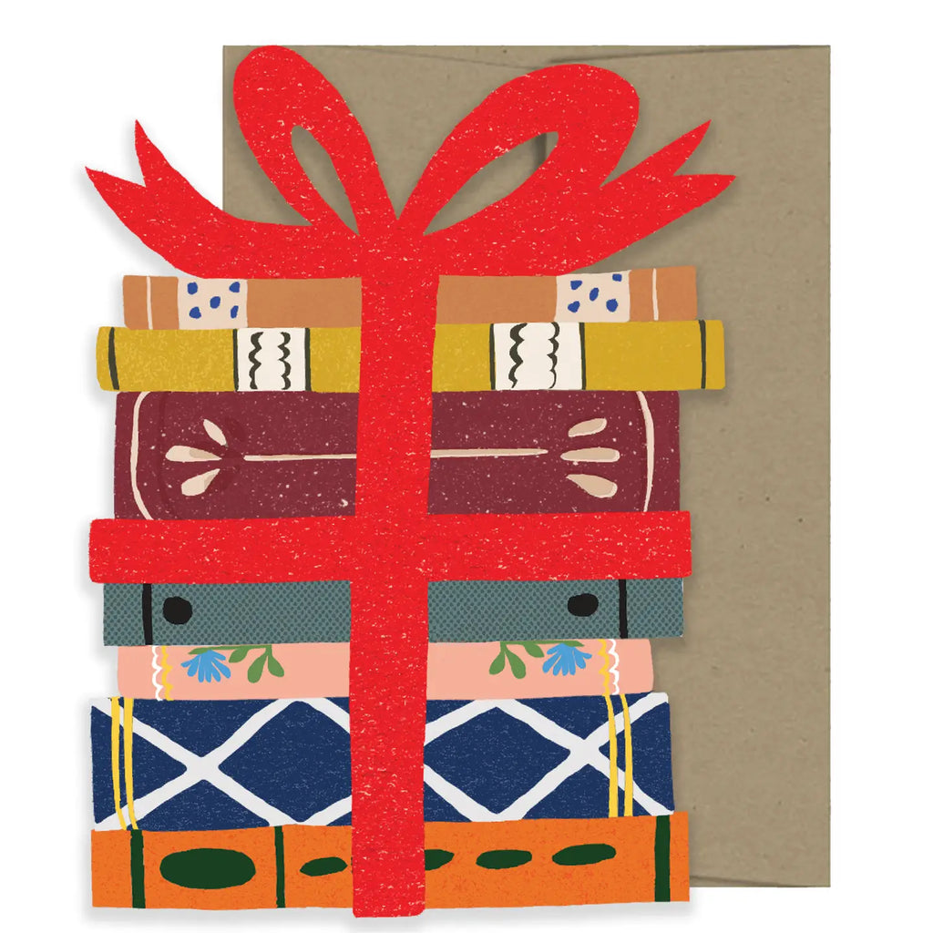 Colorful gift box with a red ribbon on a brown envelope