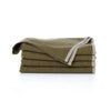 Folded green blanket with white trim on a white background