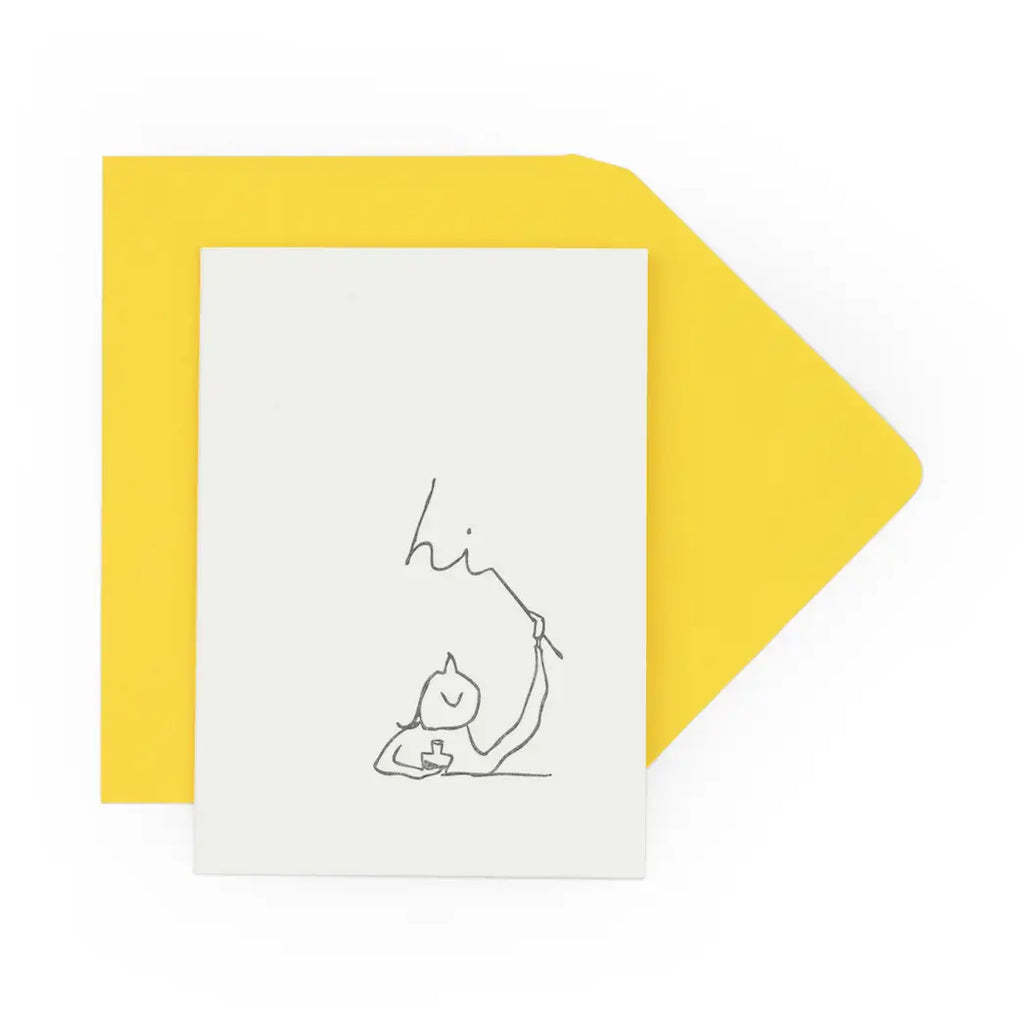 White card with a black line drawing of a person and 'hi' text, yellow envelope