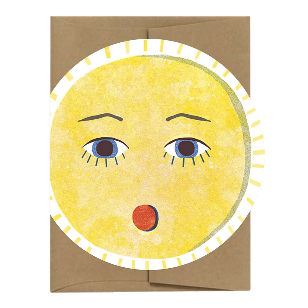 Card with a sun face design on a brown envelope