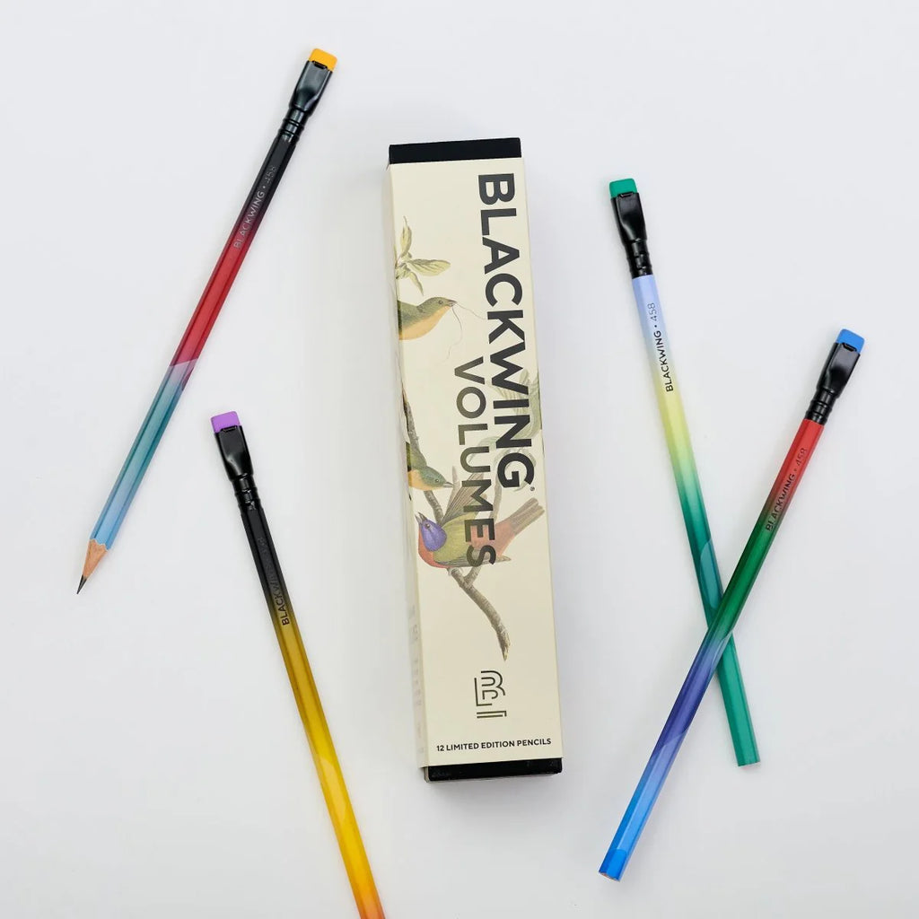 Gradient pencils with 'Blackwing Volumes' packaging on a white background