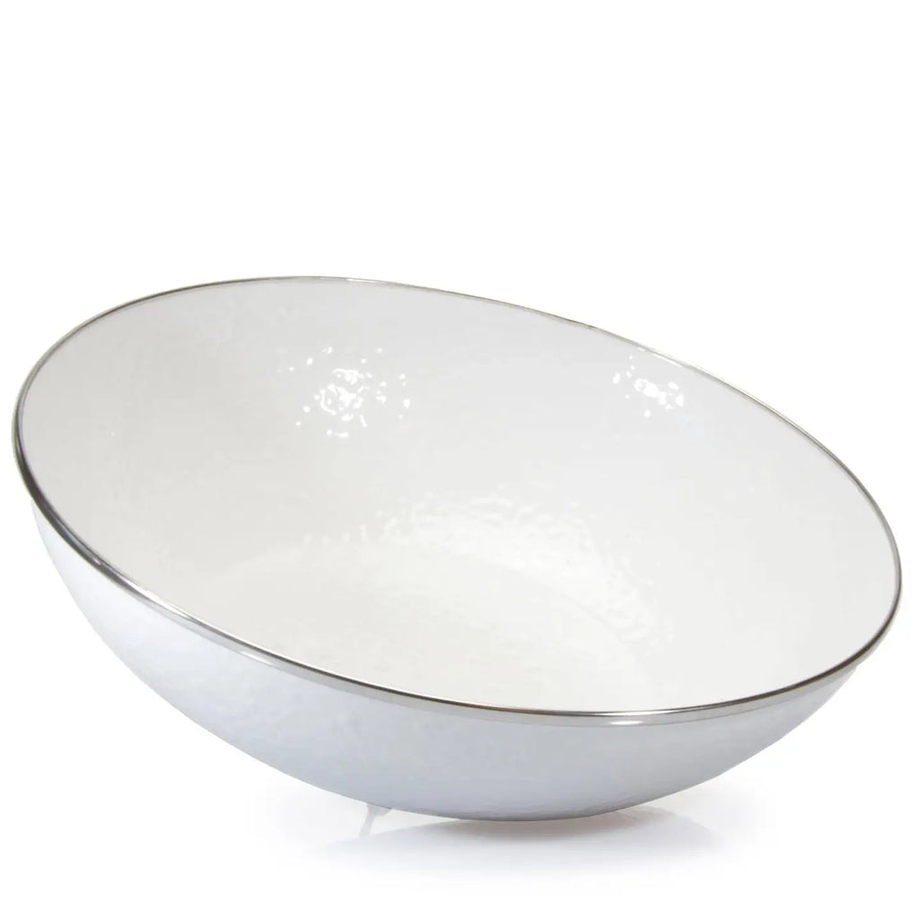 White enamel bowl with a silver rim on a white background