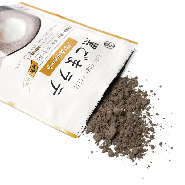 Open package of black powder with visible text on a white background