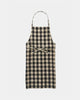 Black and beige checkered apron on a white background