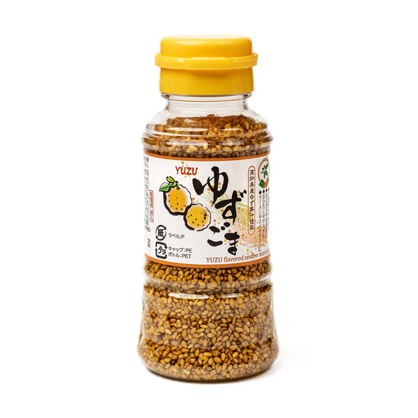 Bottle of Yuzu seasoning with a yellow cap on a white background