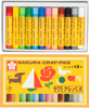 Set of Sakura Cray-Pas crayons in a box with colorful packaging.