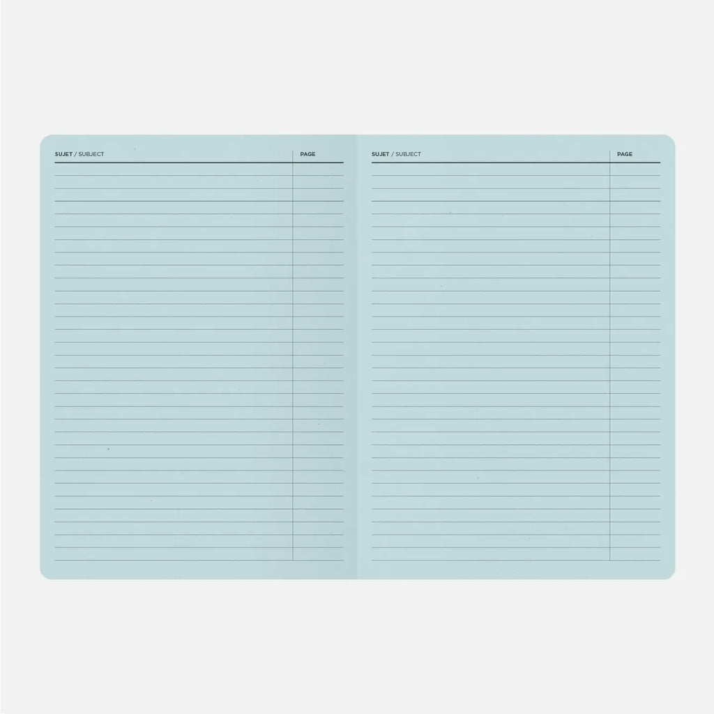 Light blue index card with grid pattern on a white background