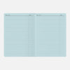 Light blue index card with grid pattern on a white background