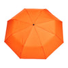 A bright orange compact umbrella shown from a top-down view against a plain white background.