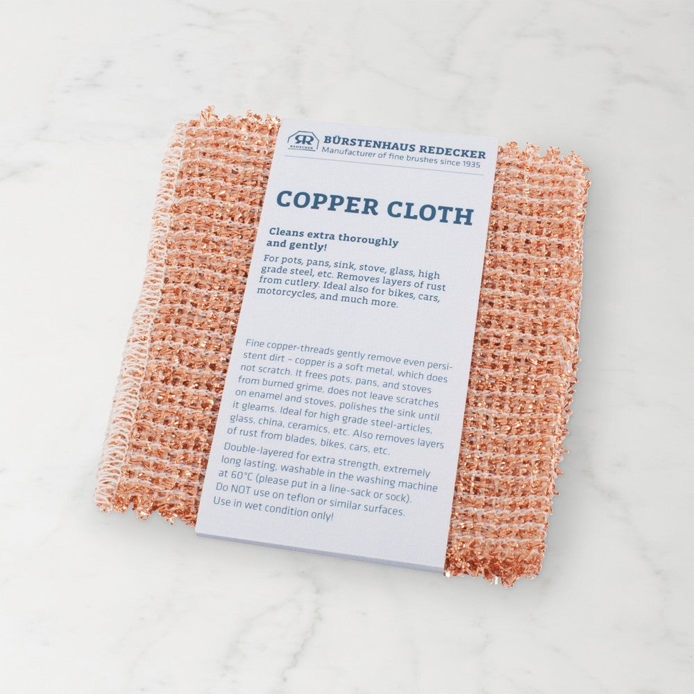 Copper cloth with a label on a light gray background