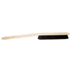 Cleaning brush with wooden handle and black bristles on a white background