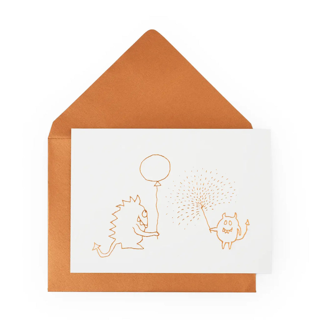 Greeting card with orange envelope featuring illustrations of two monsters with a balloon.