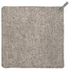 A square gray wool seat pad with fringed edges and a small gray pull tab in the top right corner, shown flat against a white background.