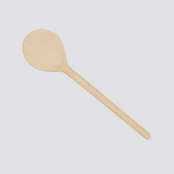 Wooden spoon on a light gray background