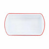 White enamel loaf pan with red rim on a white background seen from above