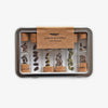 Seed collecting kit with wooden lid and transparent containers on a white background