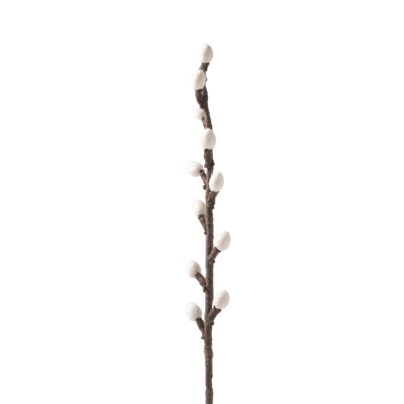 Felt branch with white buds on a white background